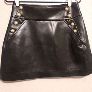 Alice & Olivia Donald side Button Faux leather mini skirt